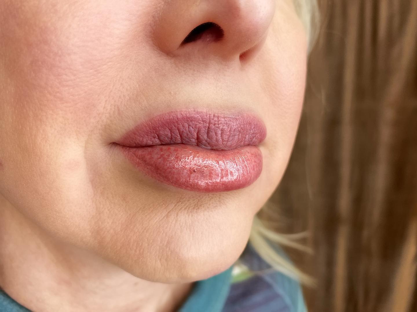 Close-up of pink lip color and the lip outline