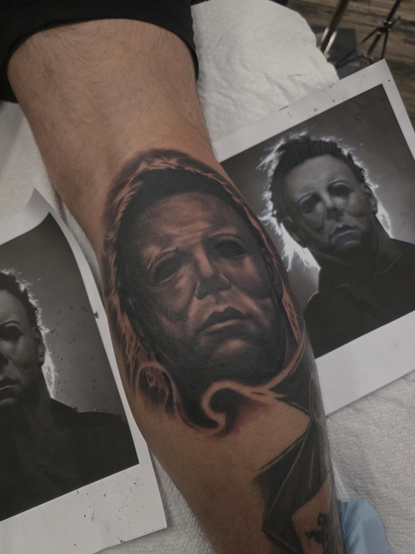 Black-and-grey Michael Myers portrait tattoo